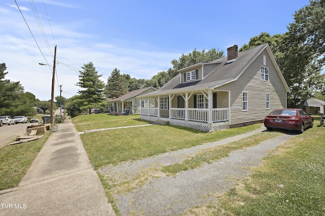 view of front facade featuring a porch and a front lawn