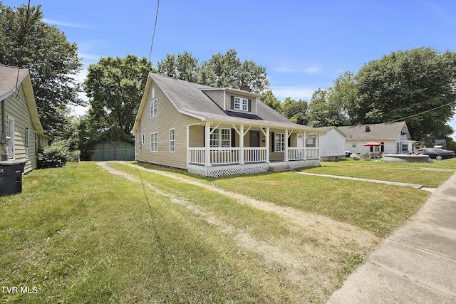 view of front of home with a porch and a front lawn