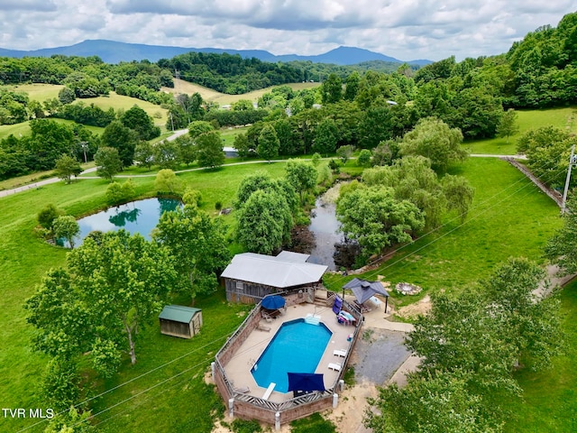 bird's eye view featuring a water and mountain view