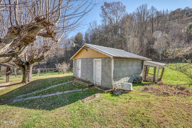 garage with a lawn