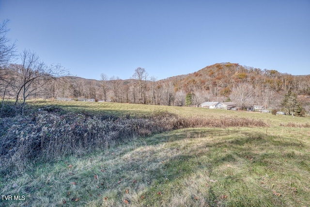 property view of mountains with a rural view