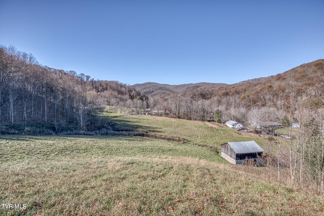 mountain view with a rural view