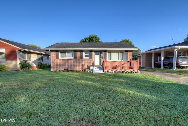 single story home featuring a front lawn and a carport