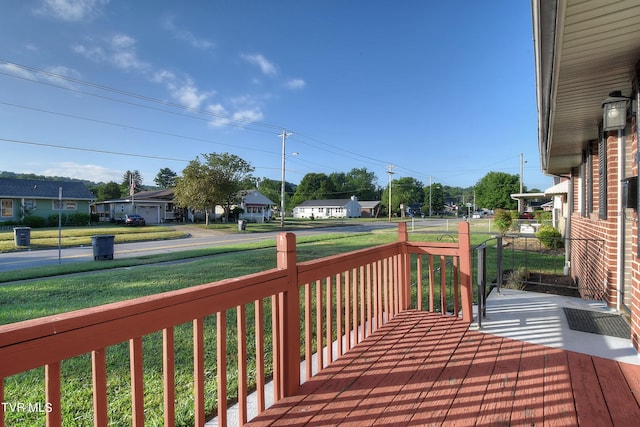 deck featuring a lawn