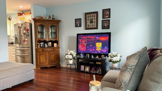 living room featuring dark wood-type flooring