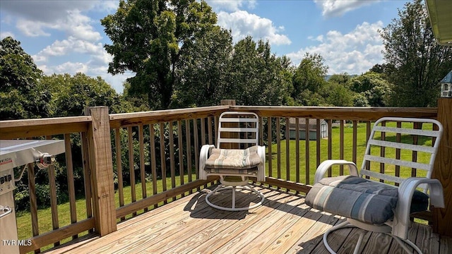 deck featuring a lawn