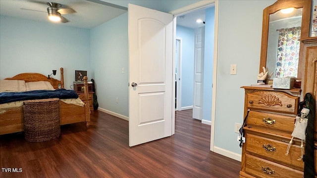 bedroom with ceiling fan and dark hardwood / wood-style flooring