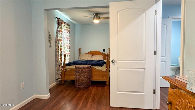 bedroom with connected bathroom, ceiling fan, and dark hardwood / wood-style flooring