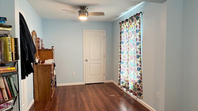 interior space featuring dark hardwood / wood-style flooring and ceiling fan