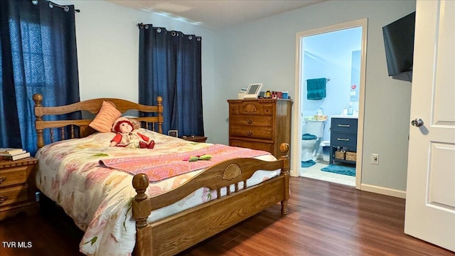 bedroom with dark wood-type flooring