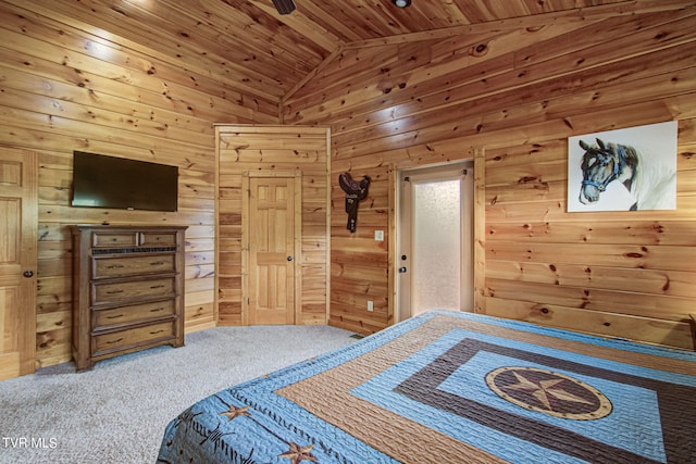 carpeted bedroom featuring lofted ceiling, wood walls, and wood ceiling