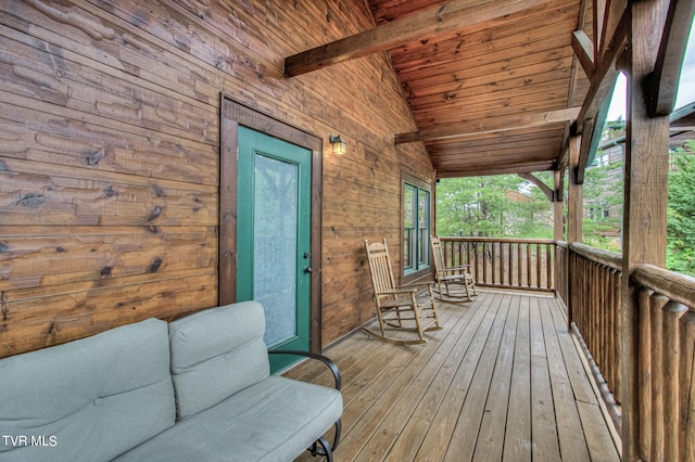 deck featuring covered porch