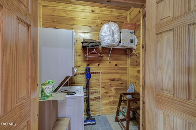 laundry room featuring wooden walls