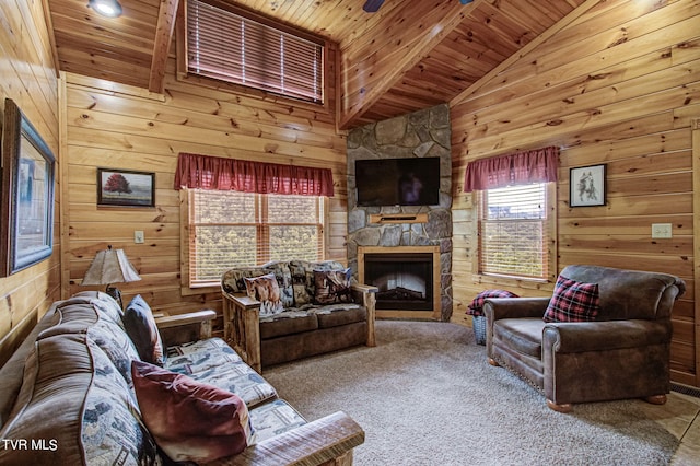 carpeted living room with wooden walls, a fireplace, wood ceiling, and lofted ceiling