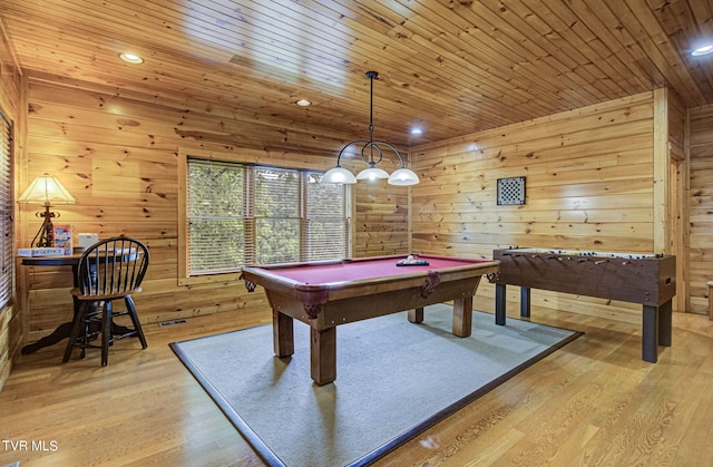 game room with wood walls, light wood-type flooring, wood ceiling, and pool table