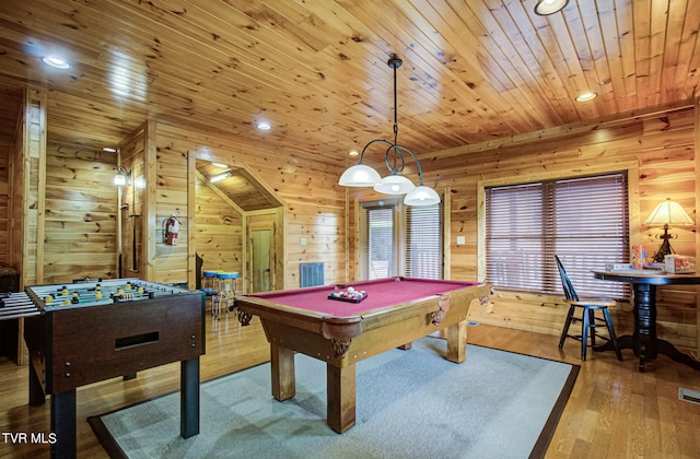 recreation room with wooden walls, hardwood / wood-style floors, wood ceiling, and pool table