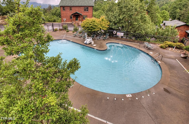 view of pool featuring a patio area