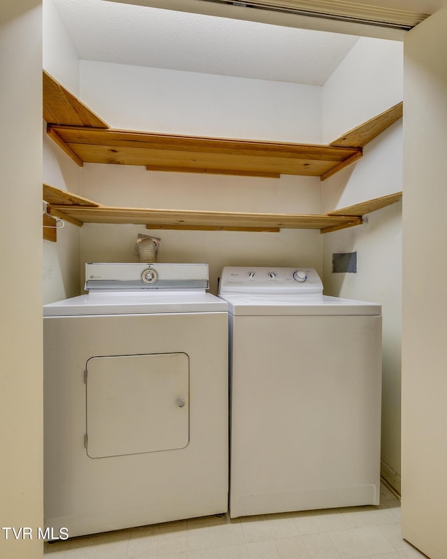 laundry area with washer and dryer