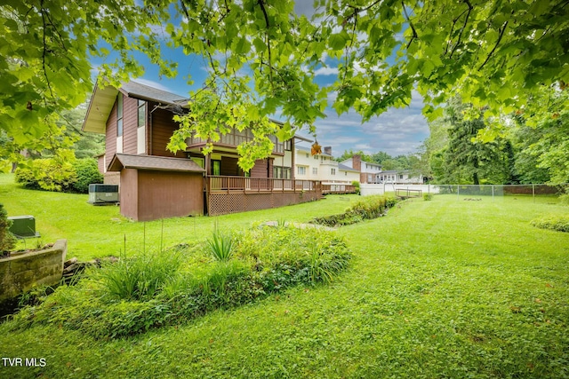 view of yard featuring a wooden deck