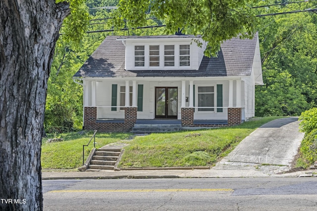 view of front of home with a front yard