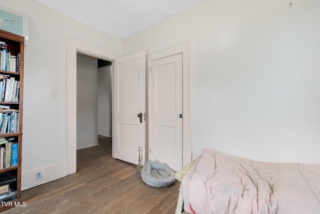 bedroom featuring dark hardwood / wood-style floors