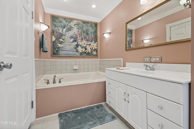 bathroom featuring tile patterned floors, vanity, crown molding, and a washtub