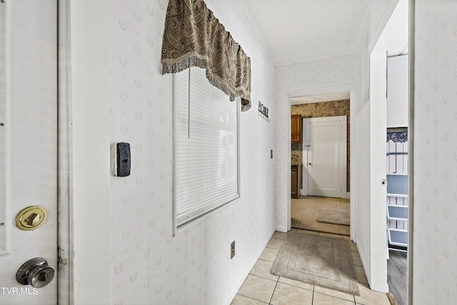 hallway featuring light tile patterned floors