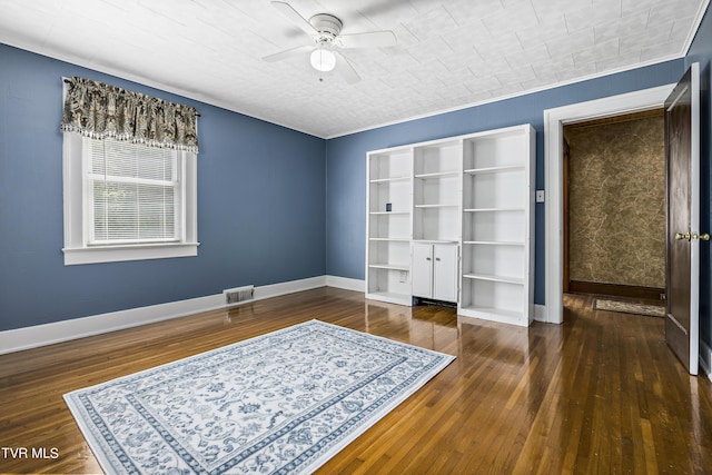 bedroom featuring ceiling fan and dark hardwood / wood-style floors