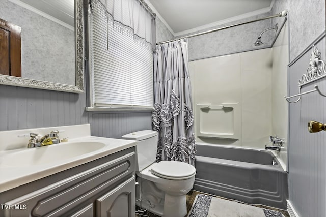 full bathroom with toilet, vanity, shower / tub combo with curtain, and crown molding