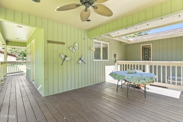 wooden terrace with ceiling fan