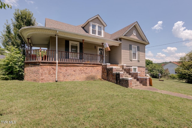 view of front facade featuring a porch and a front lawn