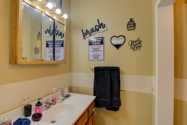 bathroom with vanity with extensive cabinet space