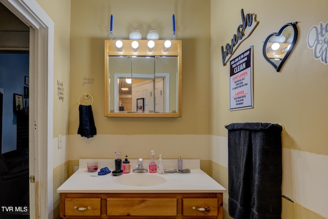 bathroom featuring oversized vanity