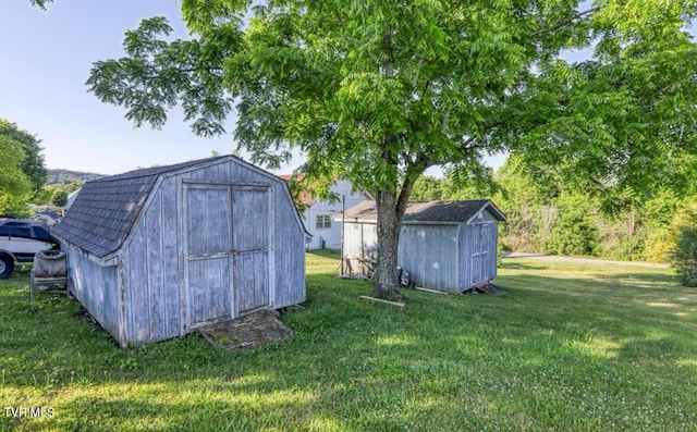 view of outdoor structure with a yard