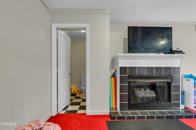 living area with tile patterned floors