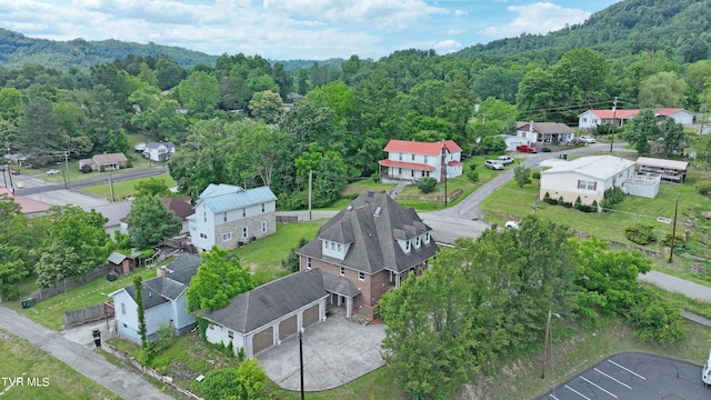 aerial view featuring a forest view