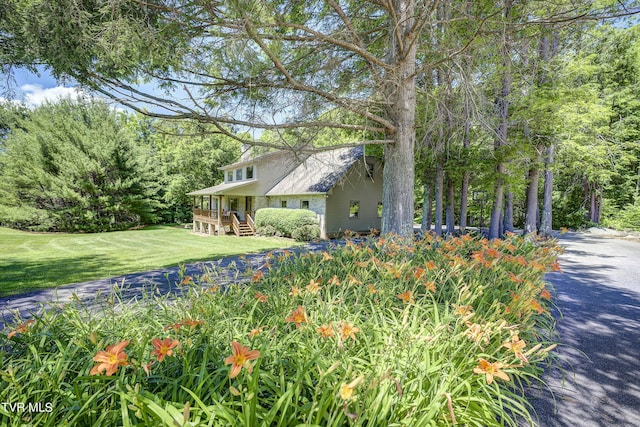 exterior space featuring a lawn