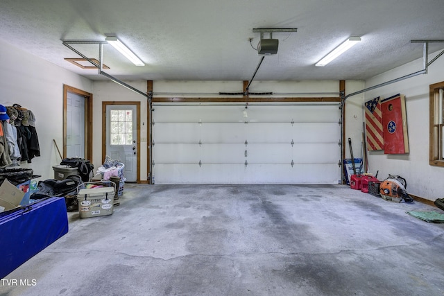 garage featuring a garage door opener