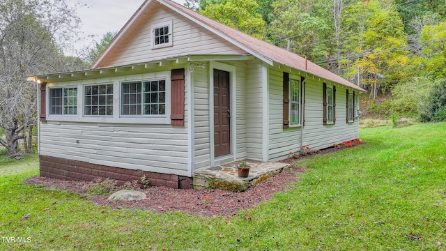 exterior space with a lawn