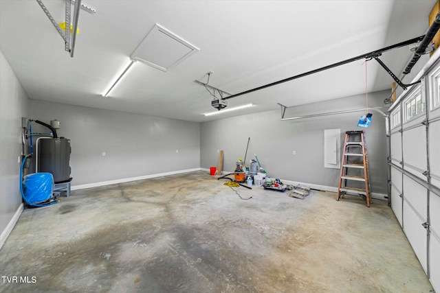 garage with a garage door opener and water heater