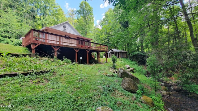 view of yard featuring a deck