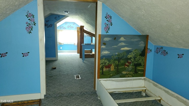 bonus room featuring lofted ceiling, a textured ceiling, and carpet flooring