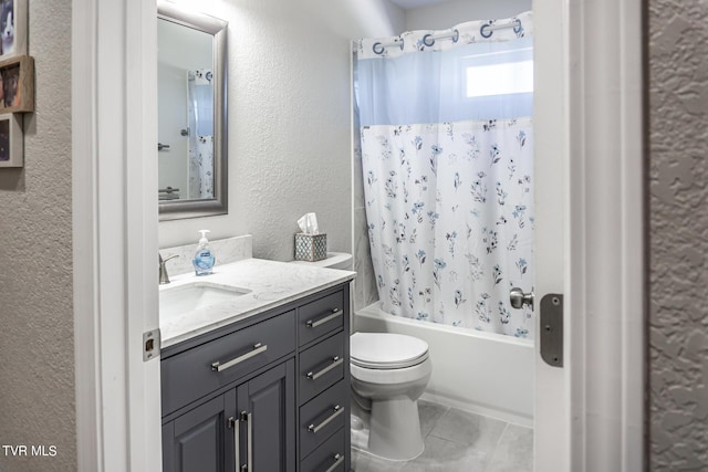 full bathroom with shower / bath combo, vanity, and toilet