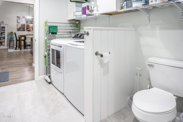 washroom with washer and clothes dryer