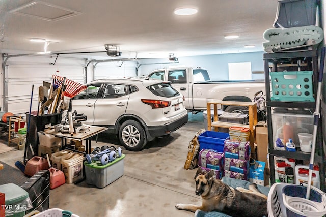 garage featuring a garage door opener