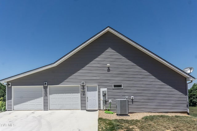 view of side of property featuring cooling unit