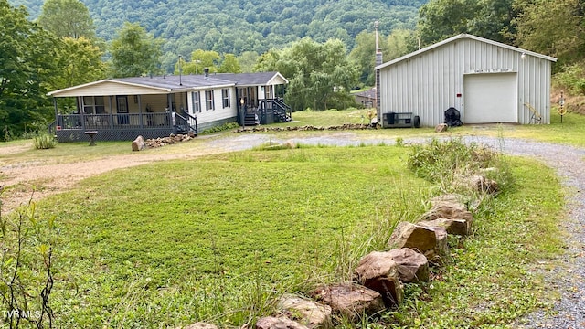 view of yard featuring a garage