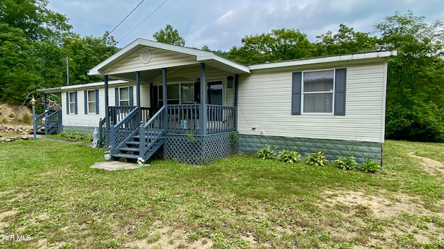 view of front of house featuring a front lawn and a porch