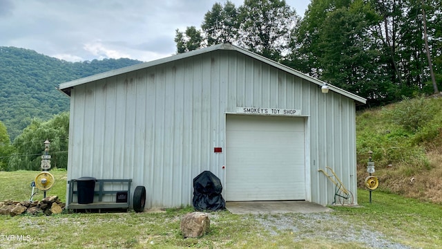 view of outdoor structure featuring a garage