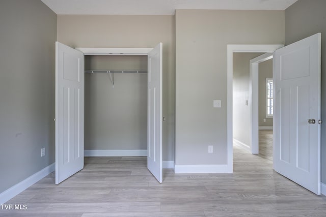 unfurnished bedroom with a closet